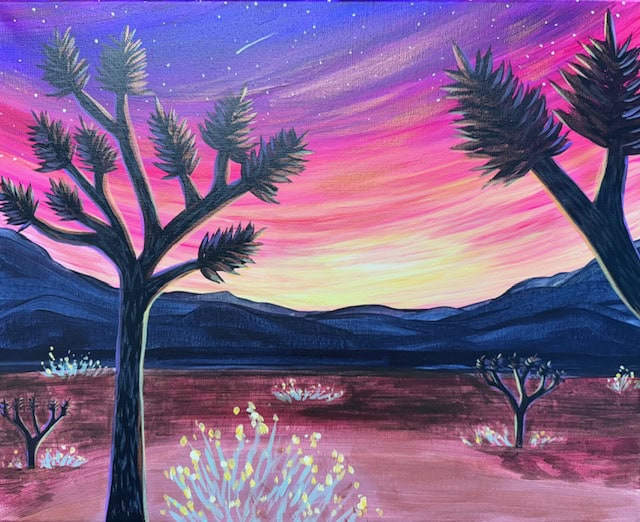 A desert landscape at sunset with silhouetted Joshua trees, colorful sky in shades of purple, pink, and orange, and mountains in the background. A shooting star is visible in the sky.