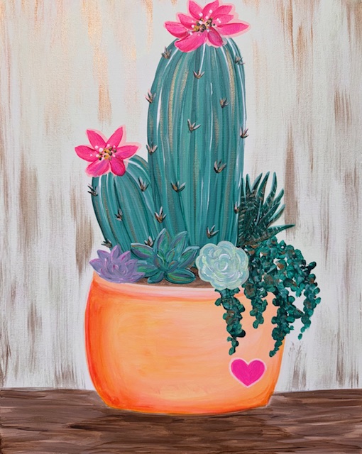 A painted cactus with pink flowers and succulents in an orange pot with a pink heart sits on a wooden surface against a textured background—perfect for your next Painting Event or to show that Love Succs!.