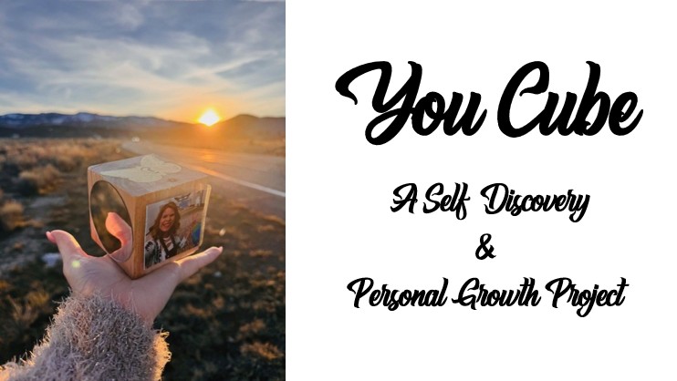 A hand holds a cube with a photo in front of a sunset landscape; text reads “You Cube: A Self-Discovery & Personal Growth Project.”.